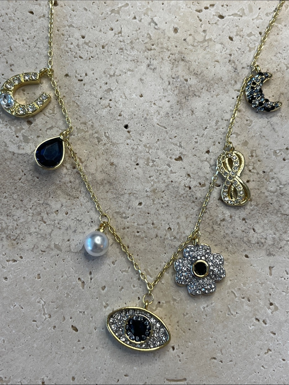 Swarovski Gold-Tone Multi-Charm Necklace with Black Stones and Pearl